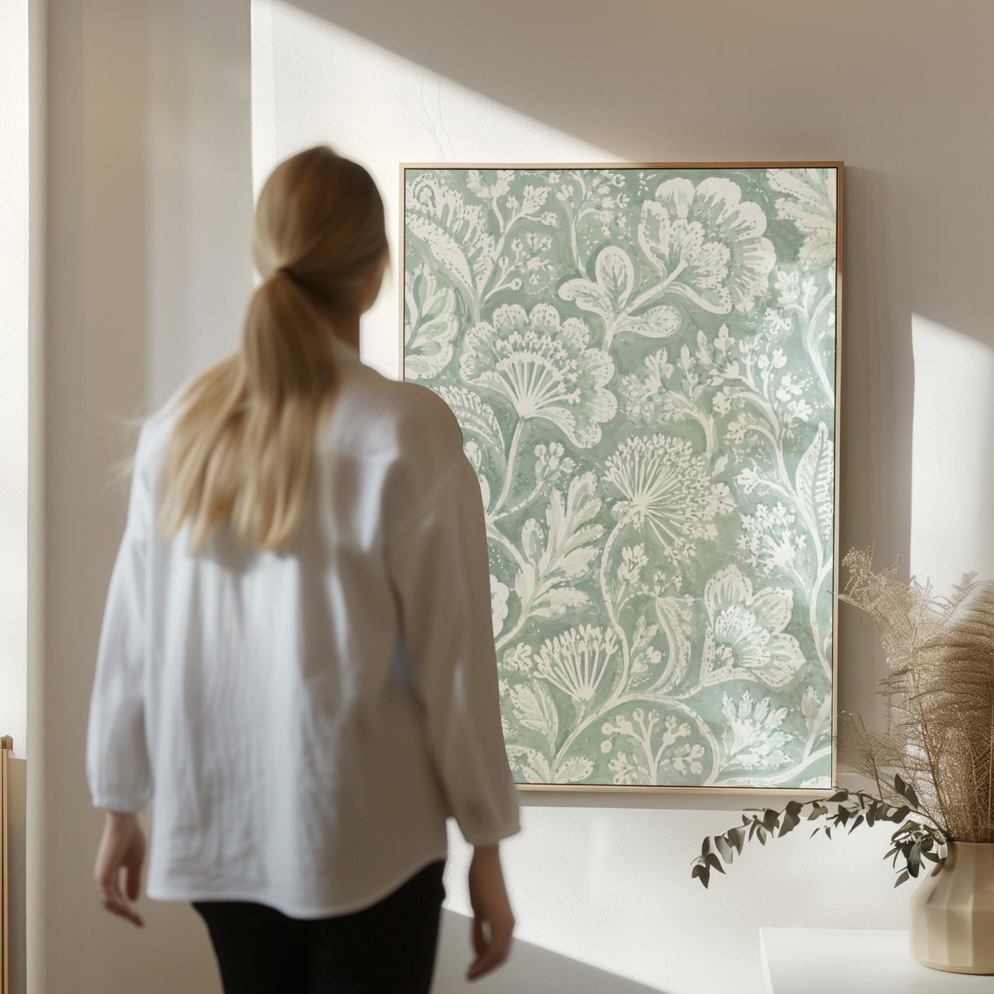Lace like botanical damask in soft sage green, canvas print presented in a light, minimal room