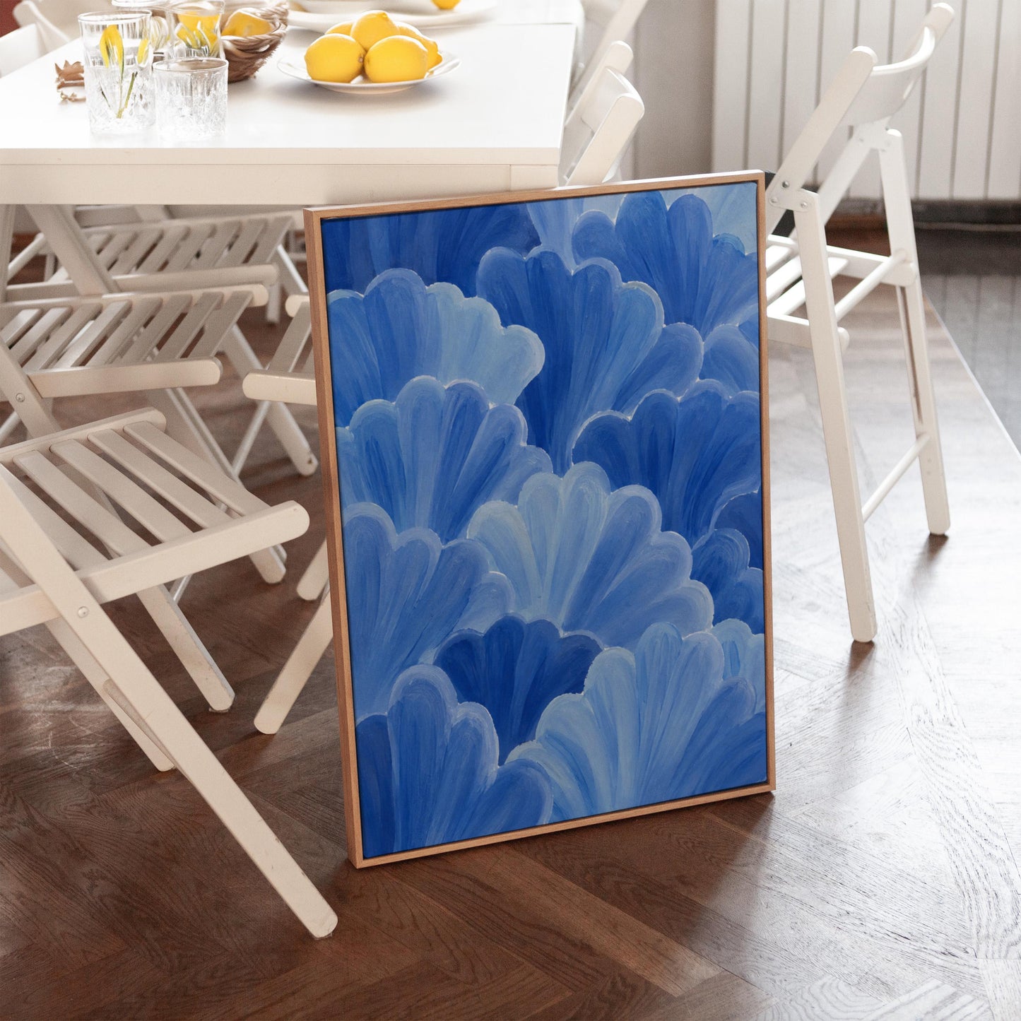 Petal fan clusters in cornflower and powder blue, canvas wall art styled against a soft white wall