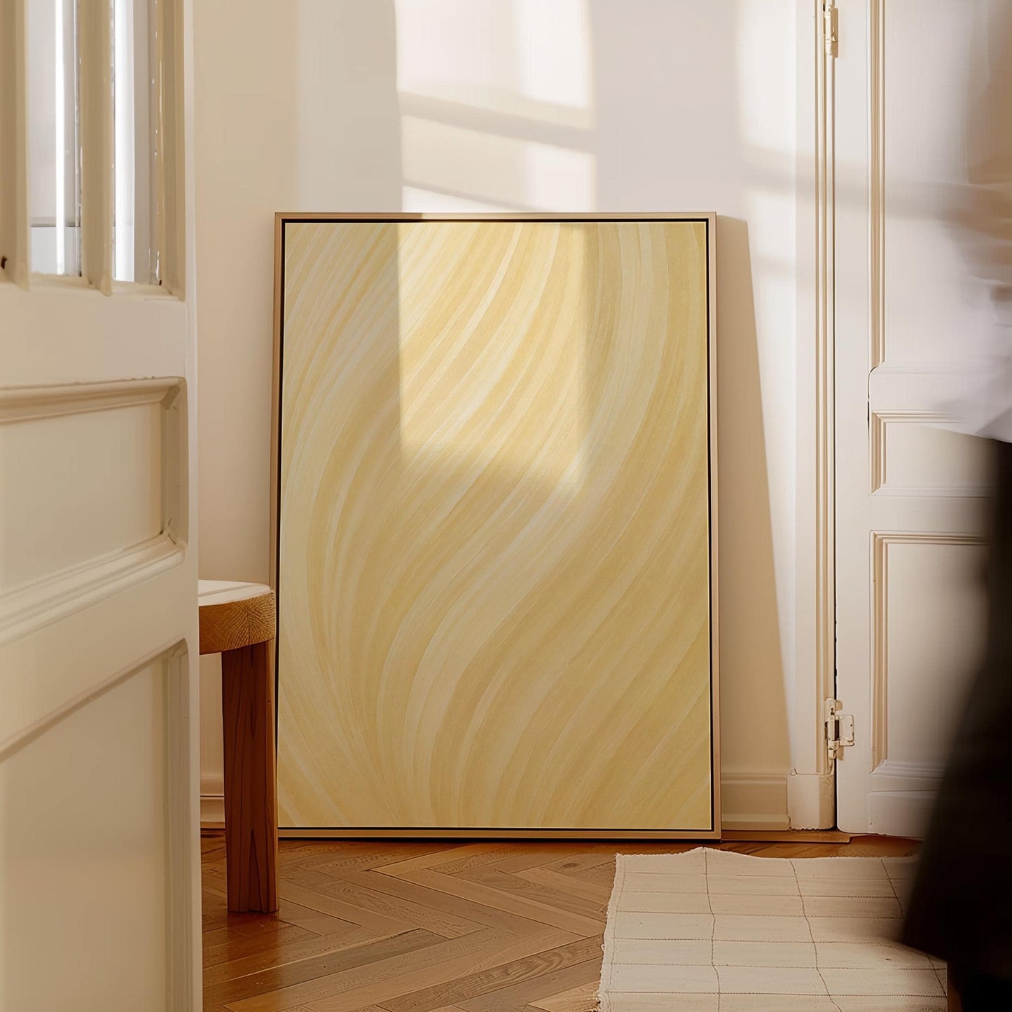 Flowing honey gold waves with soft warm glow, canvas print styled against a soft white wall