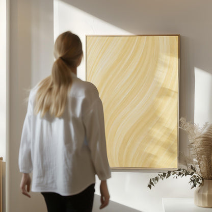 Flowing honey gold waves with soft warm glow, canvas print shown to scale in a furnished room