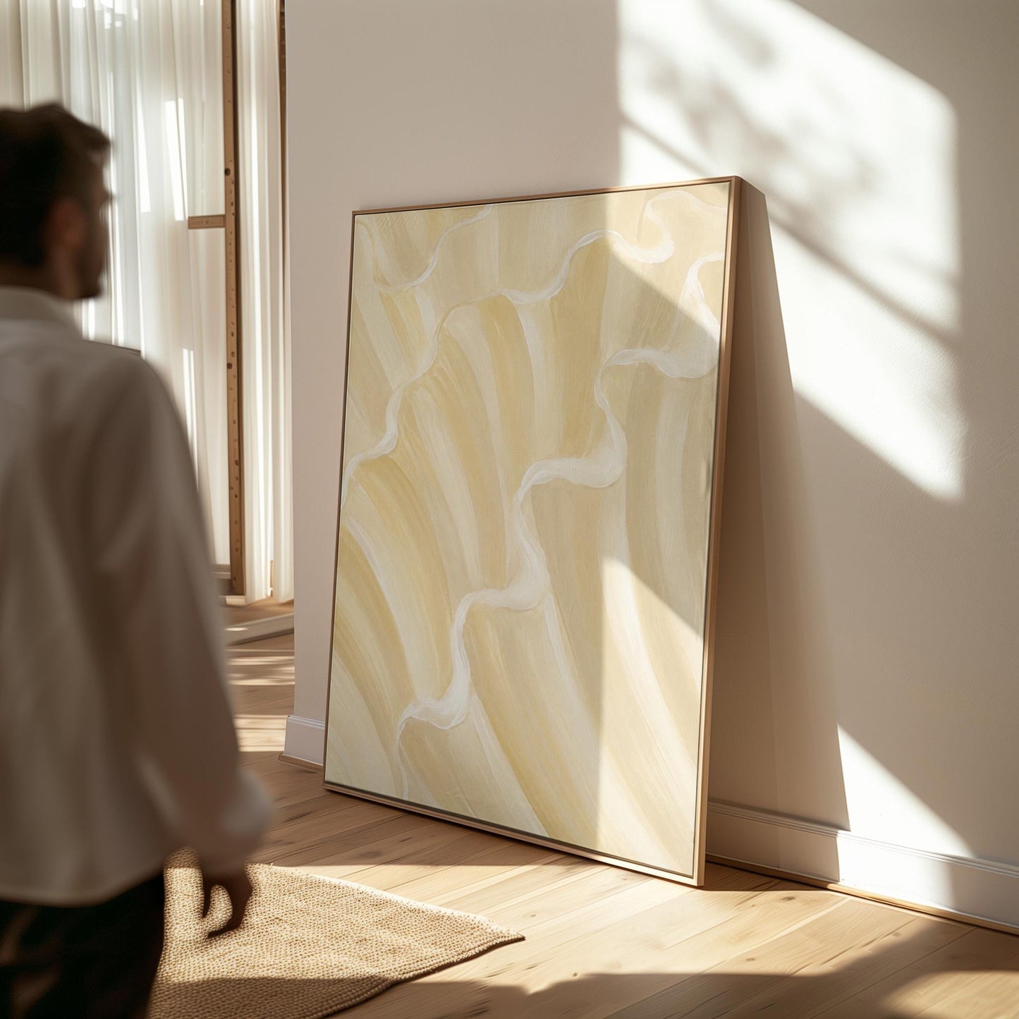 Ruffled wave folds in champagne cream and gold, canvas print shown in a sunlit, contemporary room