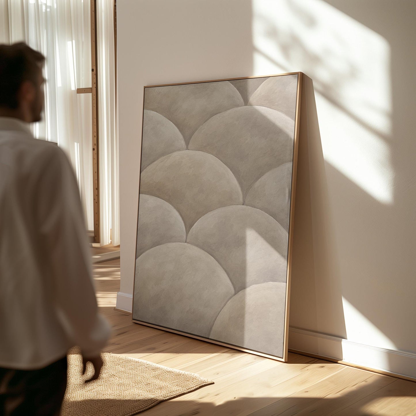 Overlapping dome scallop pattern in warm greige, canvas print presented in a light, minimal room