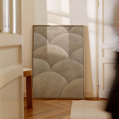 Overlapping dome scallop pattern in warm greige, canvas print shown to scale in a furnished room
