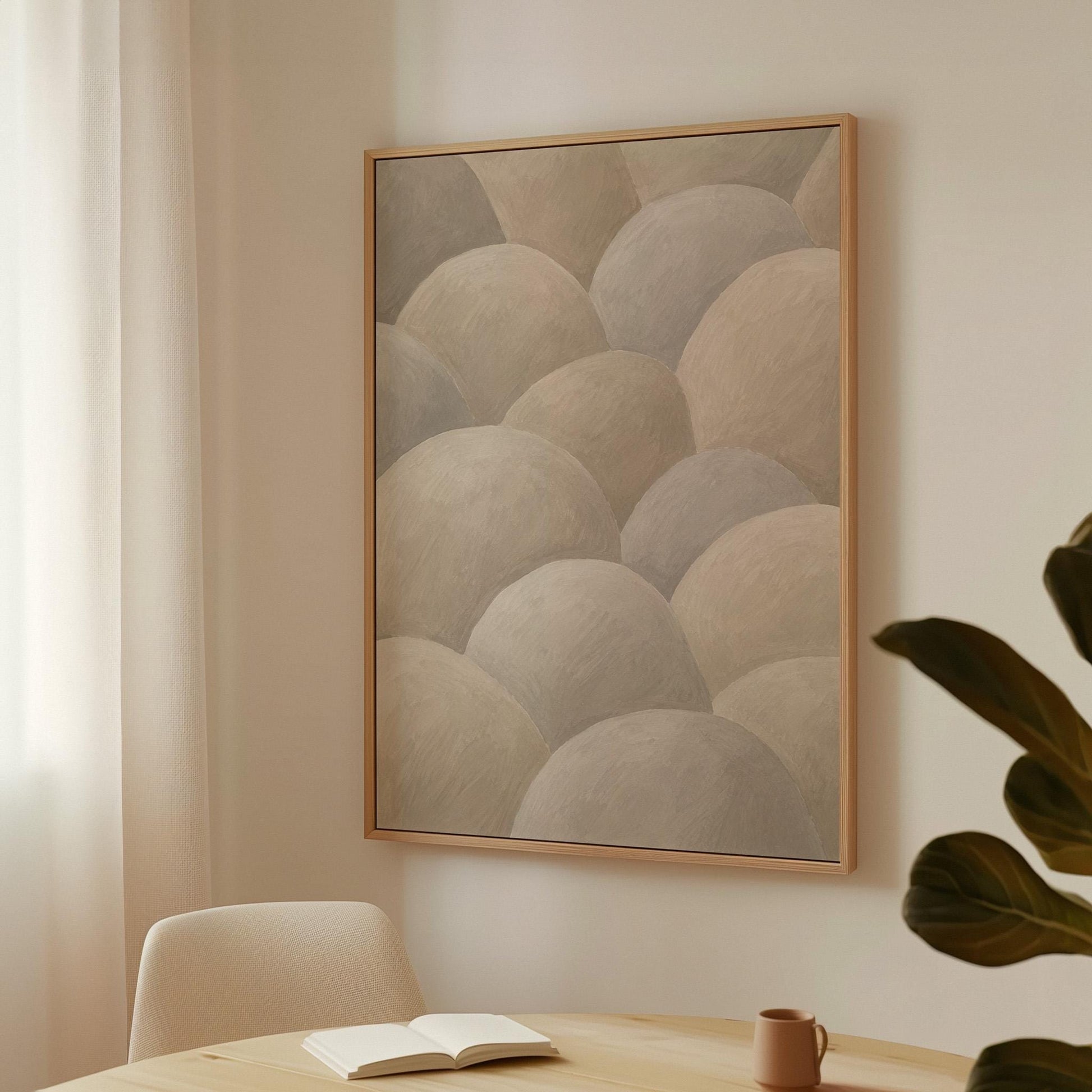 Rows of soft dome shapes in stone gray and beige, canvas print displayed on a neutral wall in a styled interior