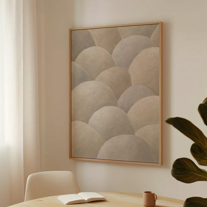 Rows of soft dome shapes in stone gray and beige, canvas print displayed on a neutral wall in a styled interior