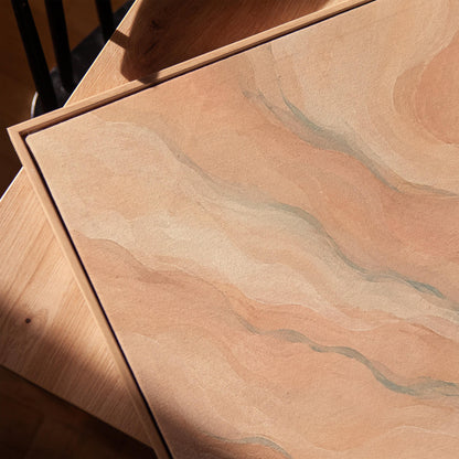 Soft flowing waves in peach blush and gray pastel, canvas print in a warm, minimally styled interior