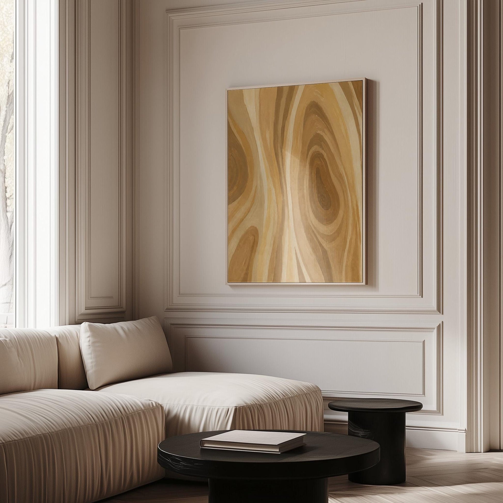 Concentric swirling lines in amber and caramel, canvas wall art styled against a soft white wall
