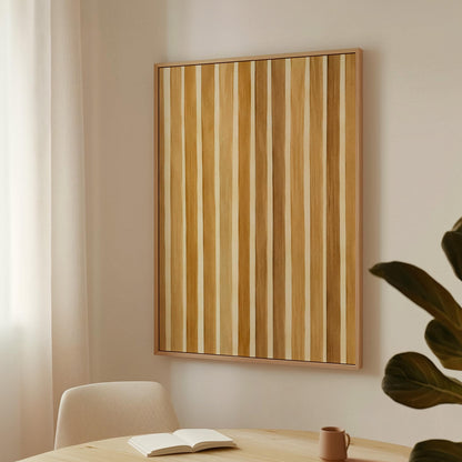 Vertical golden slat stripes in honey tones, canvas print hanging in a calm, modern living space