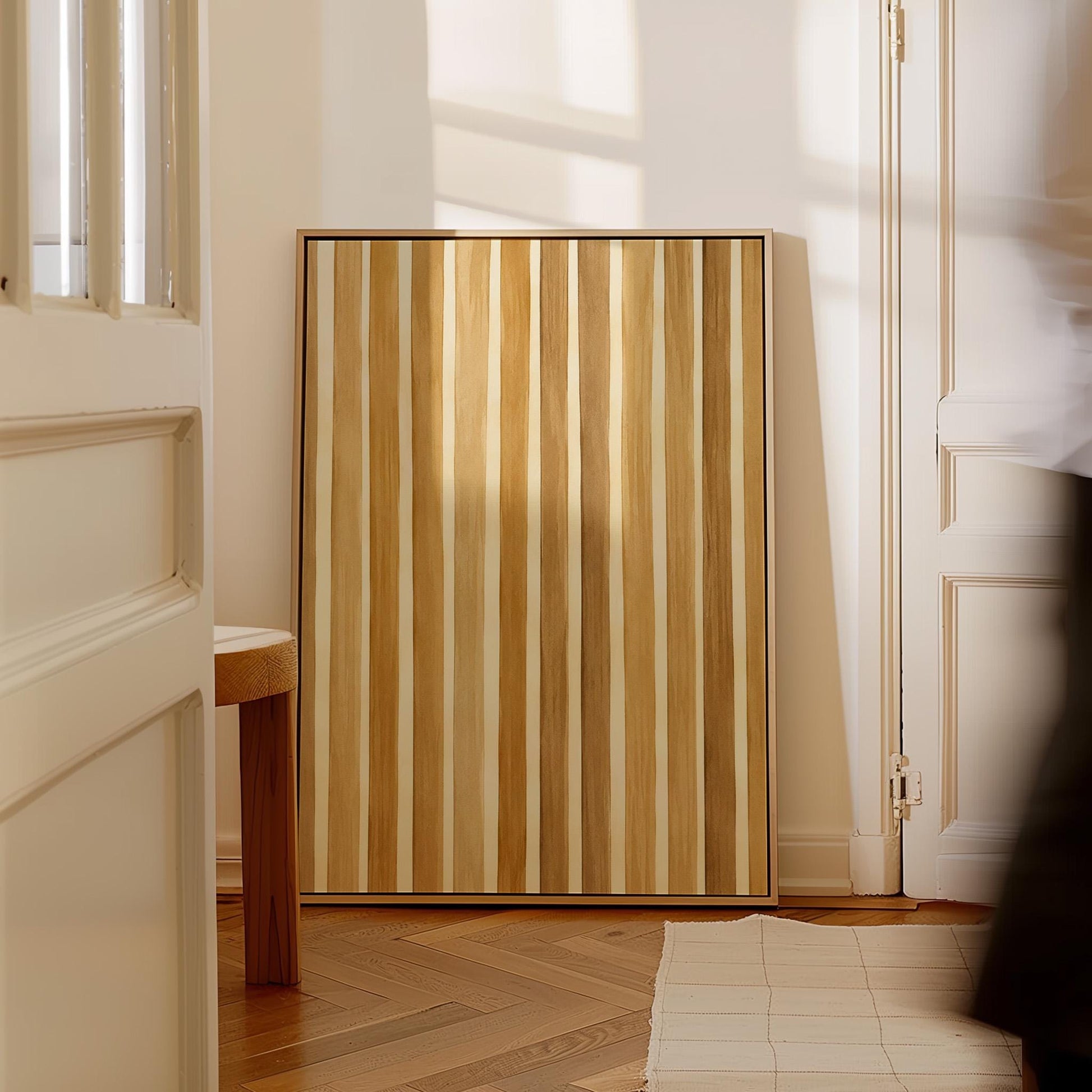 Vertical golden slat stripes in honey tones, canvas print shown to scale in a furnished room