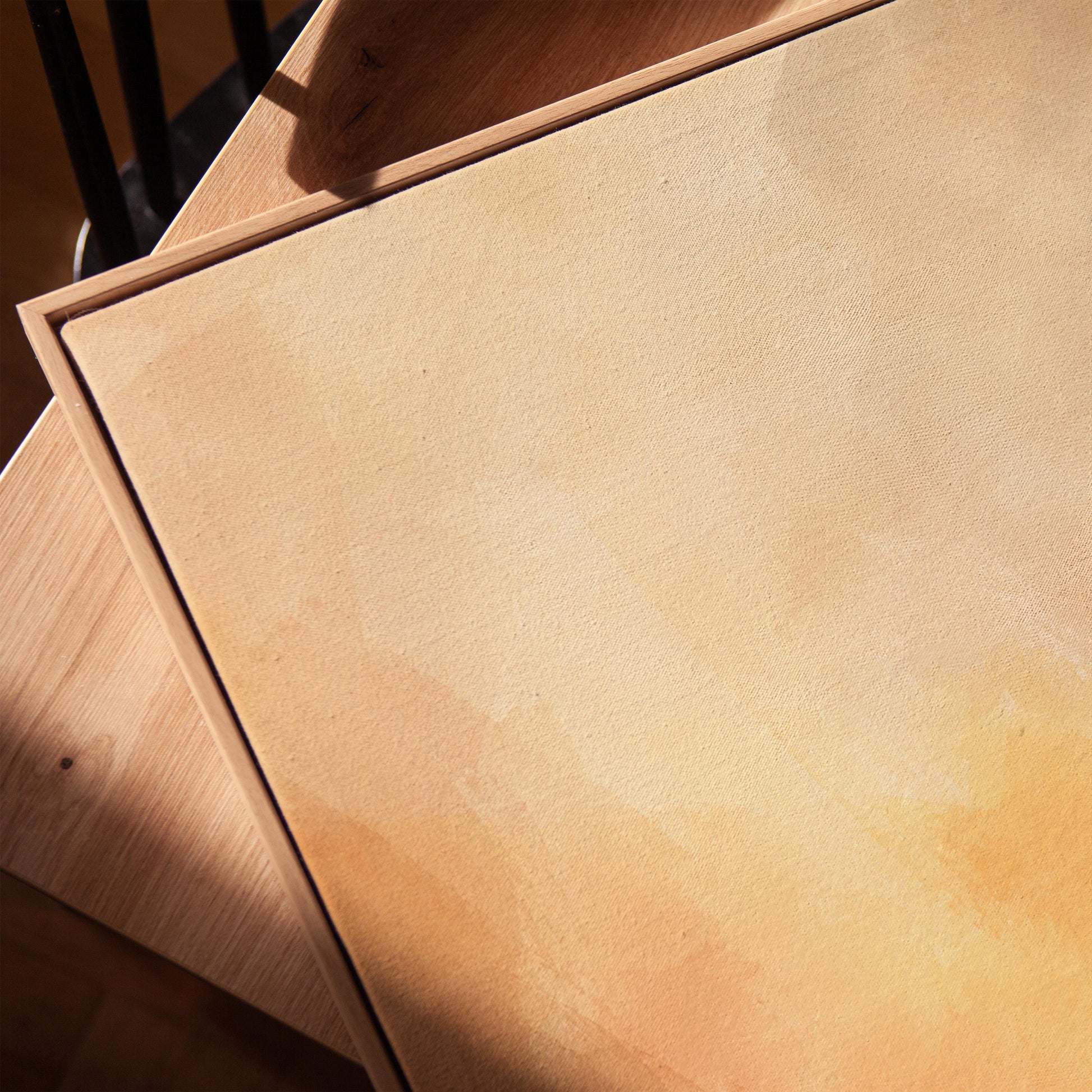 Radiant golden peach glow like hazy sunrise, canvas print in a warm, minimally styled interior