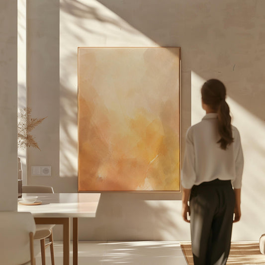 Radiant golden peach glow like hazy sunrise, canvas print hanging in a calm, modern living space