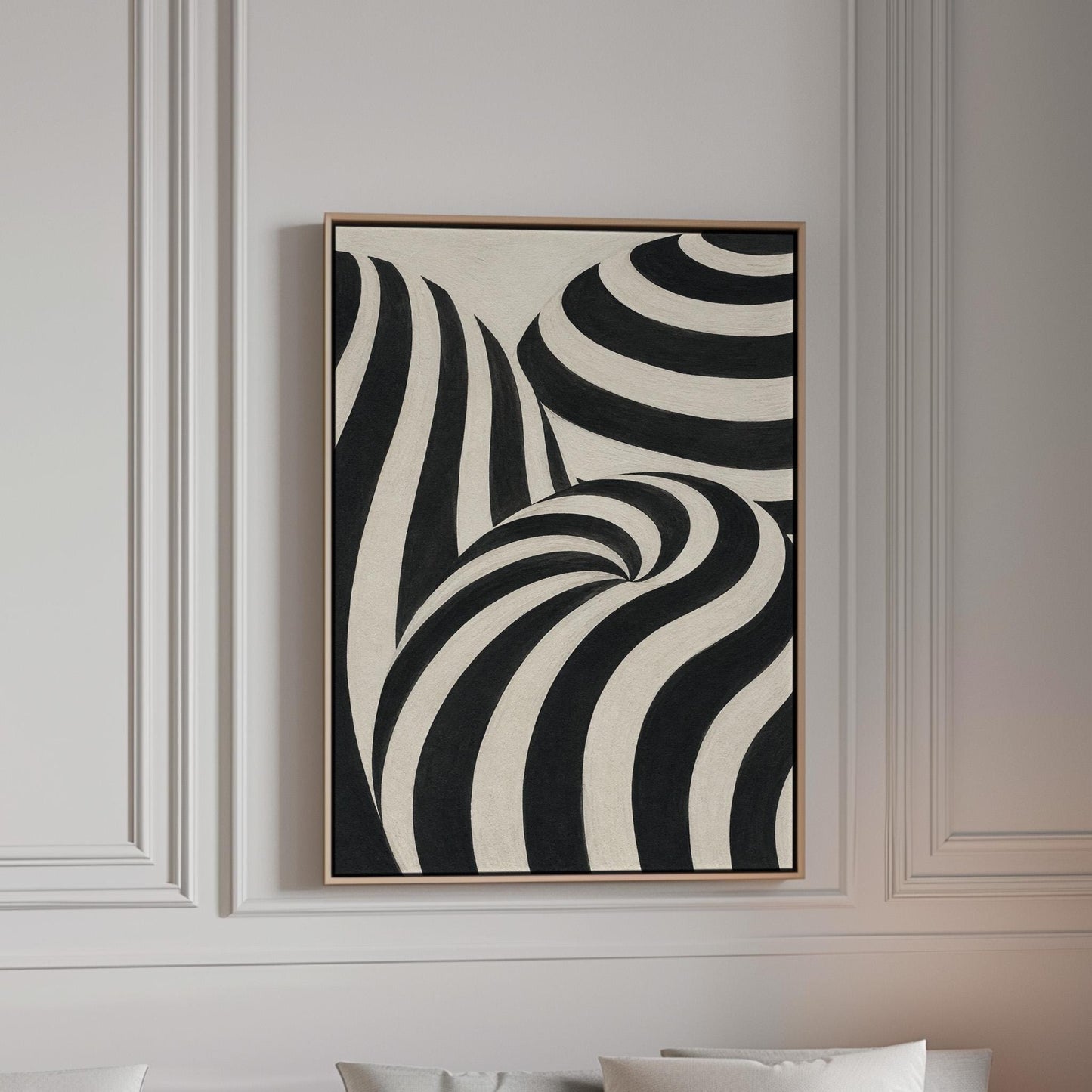 Swirling black and white striped forms, canvas print in a bright room with natural daylight