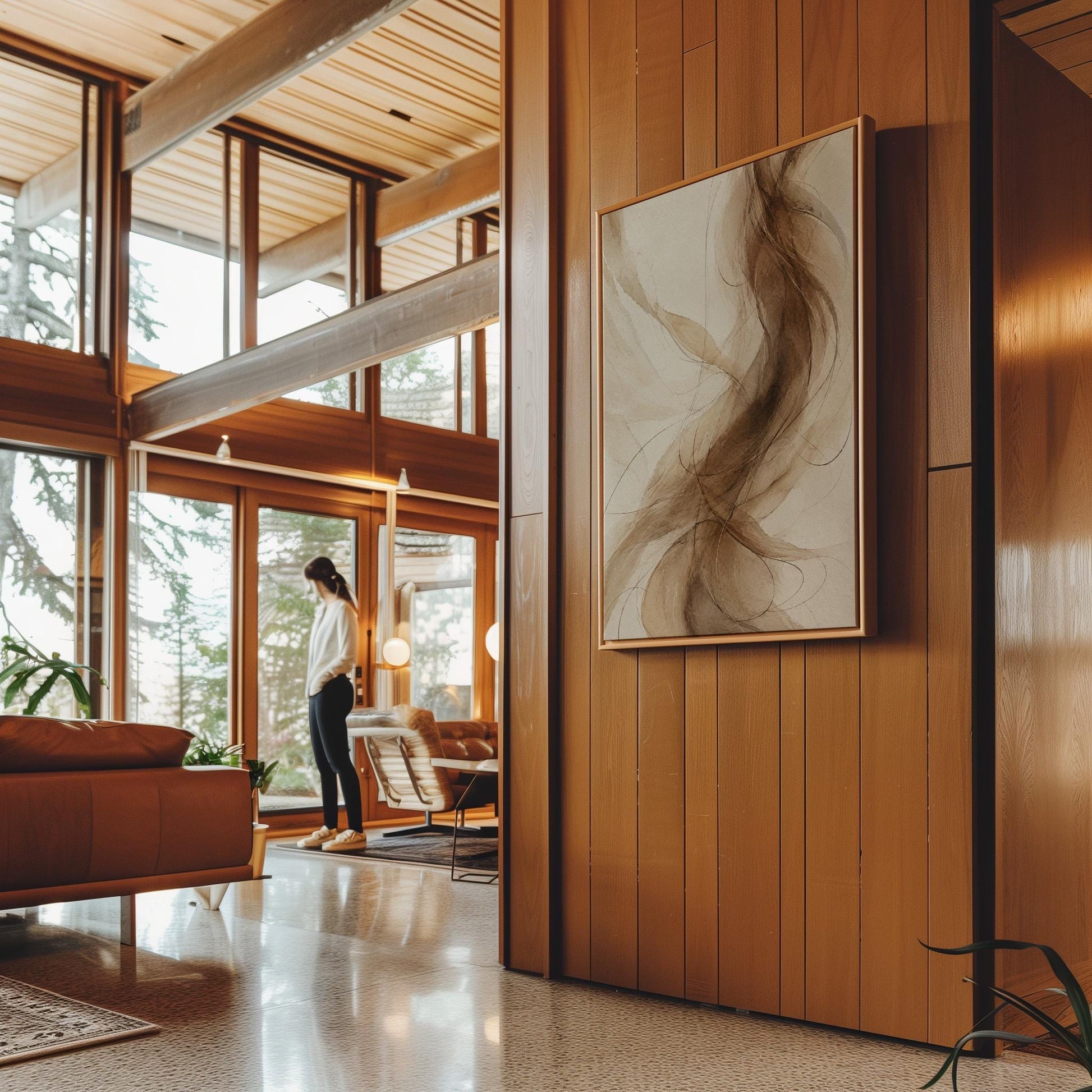 Wispy brown strands flowing across cream background, canvas print shown in a sunlit, contemporary room