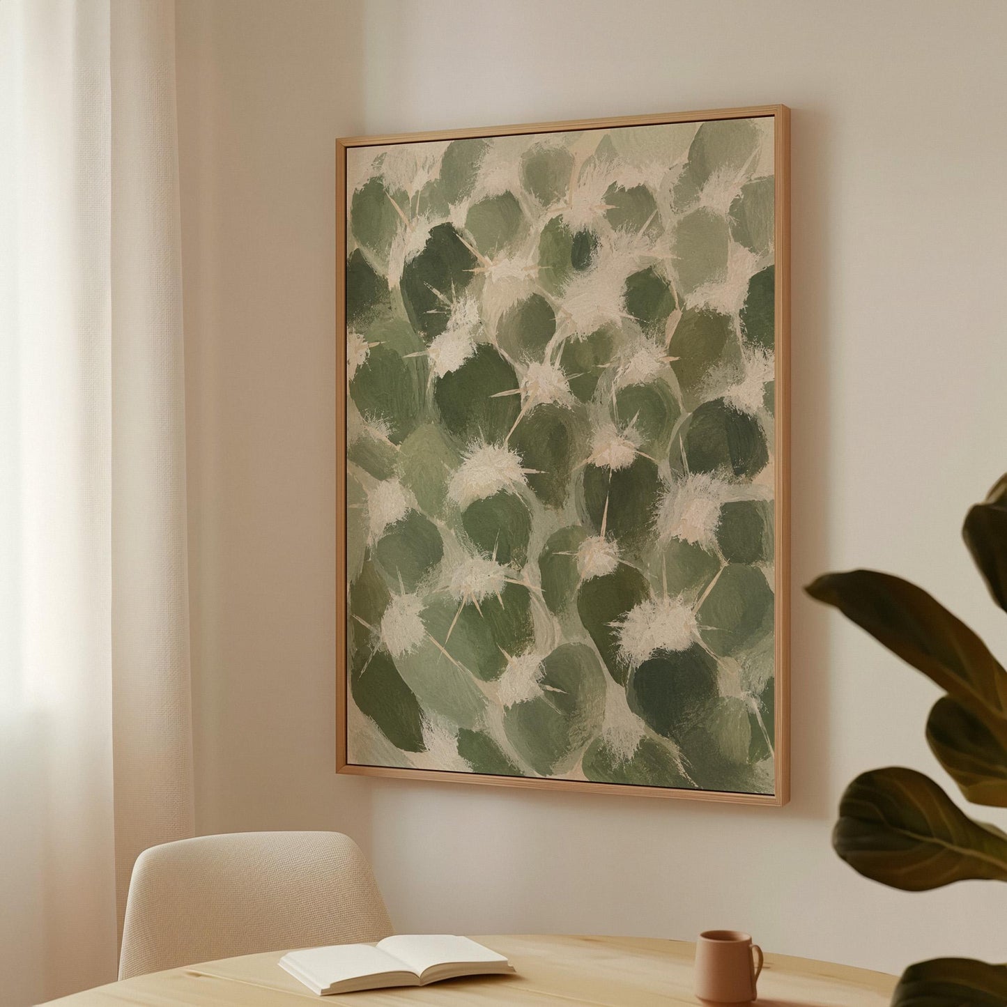 Cactus pads pattern with pale spines in sage green, canvas wall art styled against a soft white wall