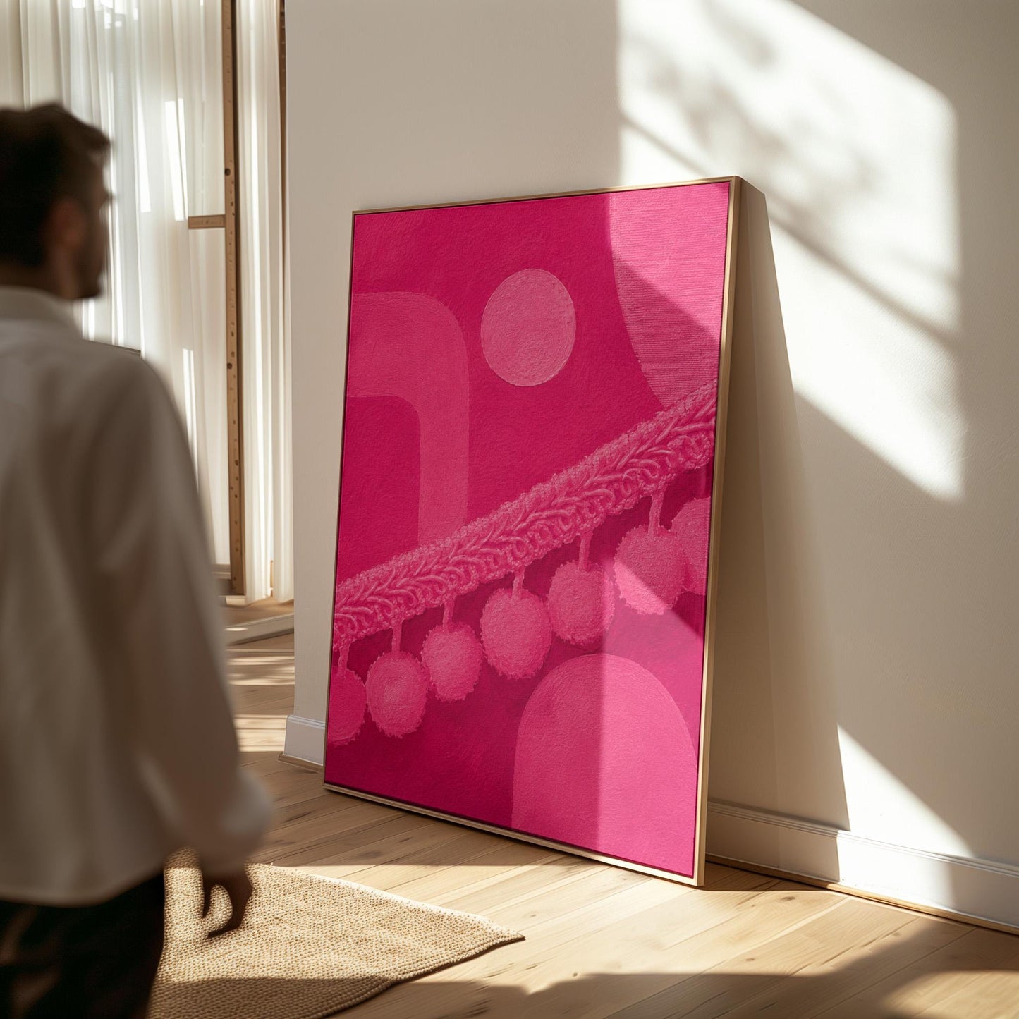 Hot magenta composition with arches and pom pom garland, canvas print seen in a warm interior with natural light