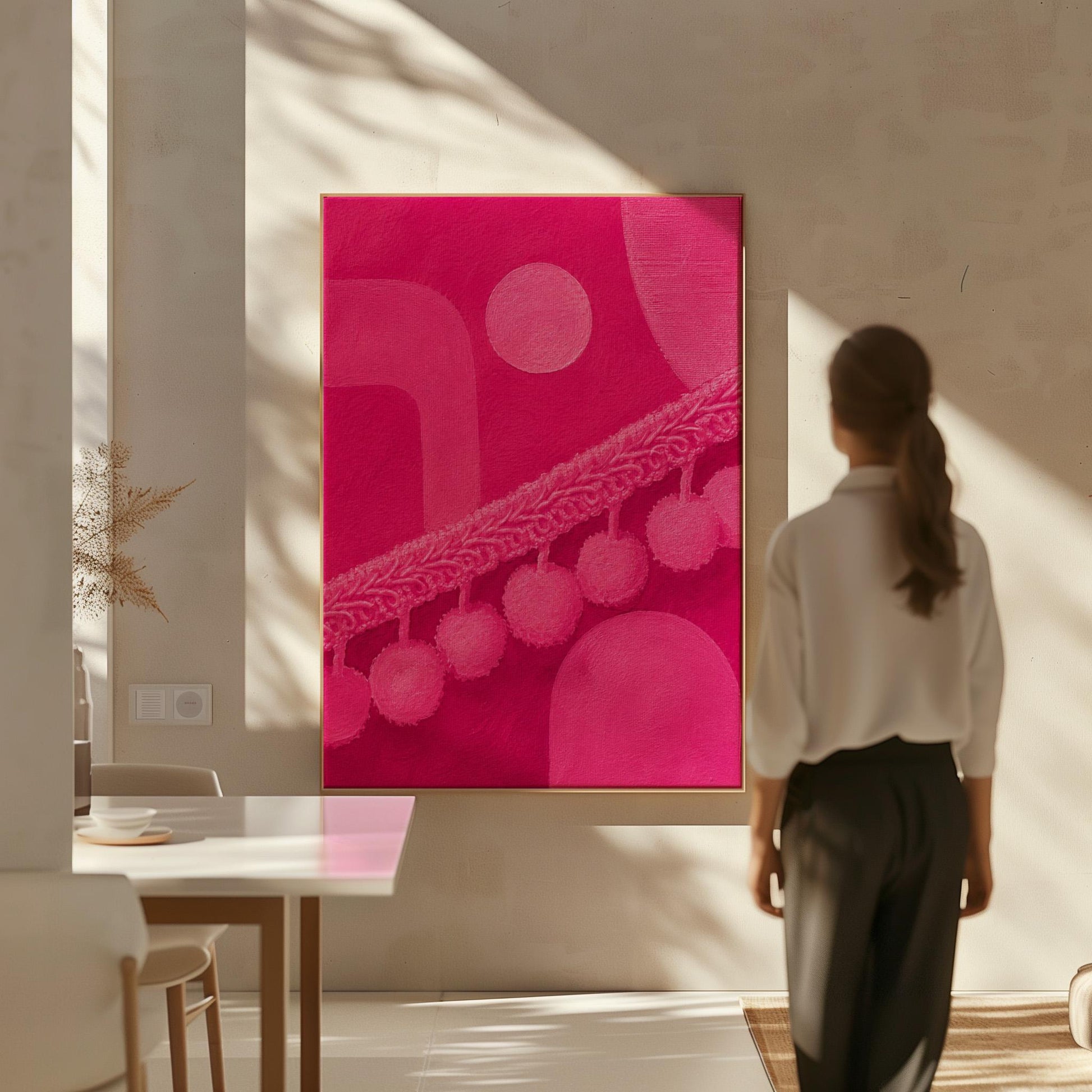 Hot magenta composition with arches and pom pom garland, canvas print shown to scale in a furnished room