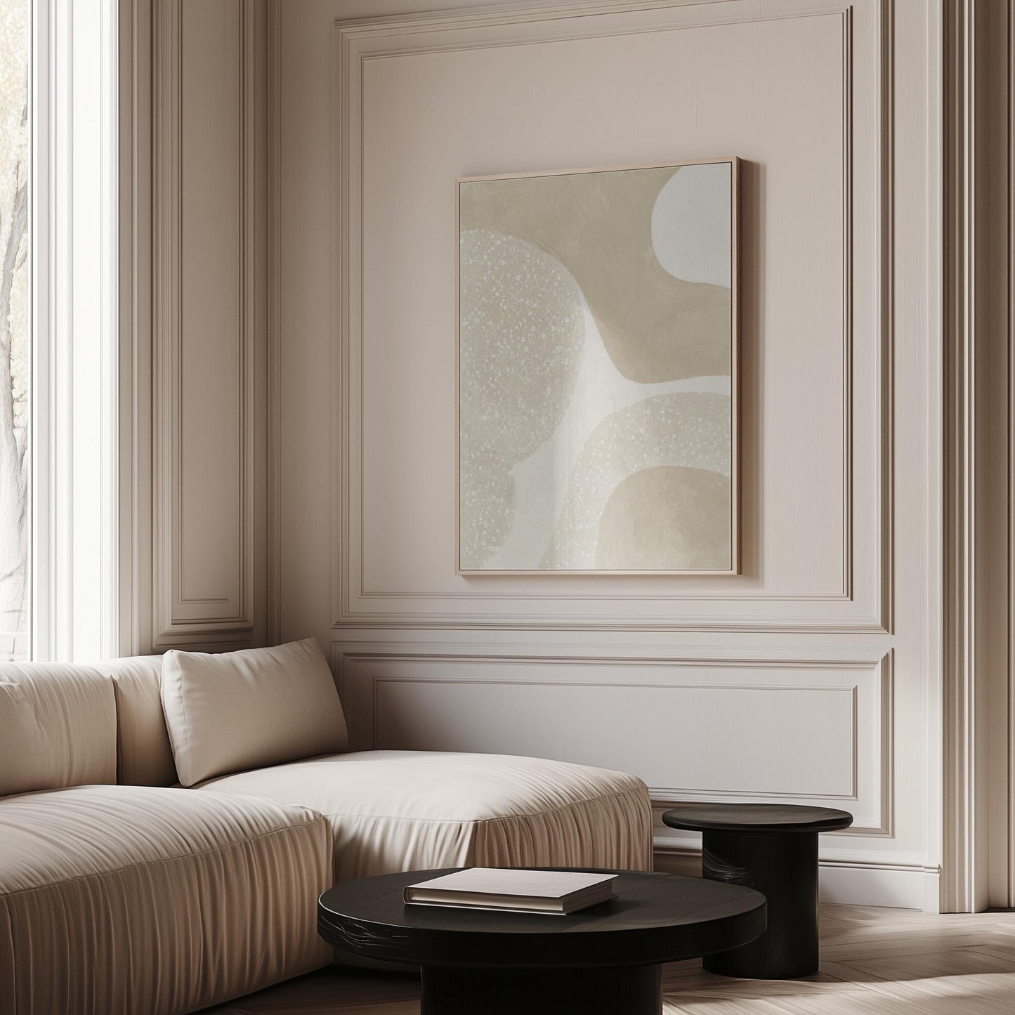 Soft speckled organic shapes in pearl and cream, canvas print seen in a warm interior with natural light