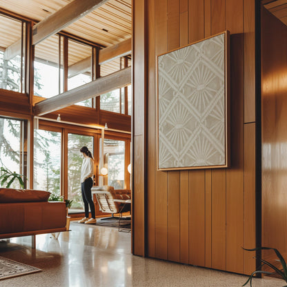 Diamond and fan lace pattern in ivory tones, canvas print shown in a sunlit, contemporary room