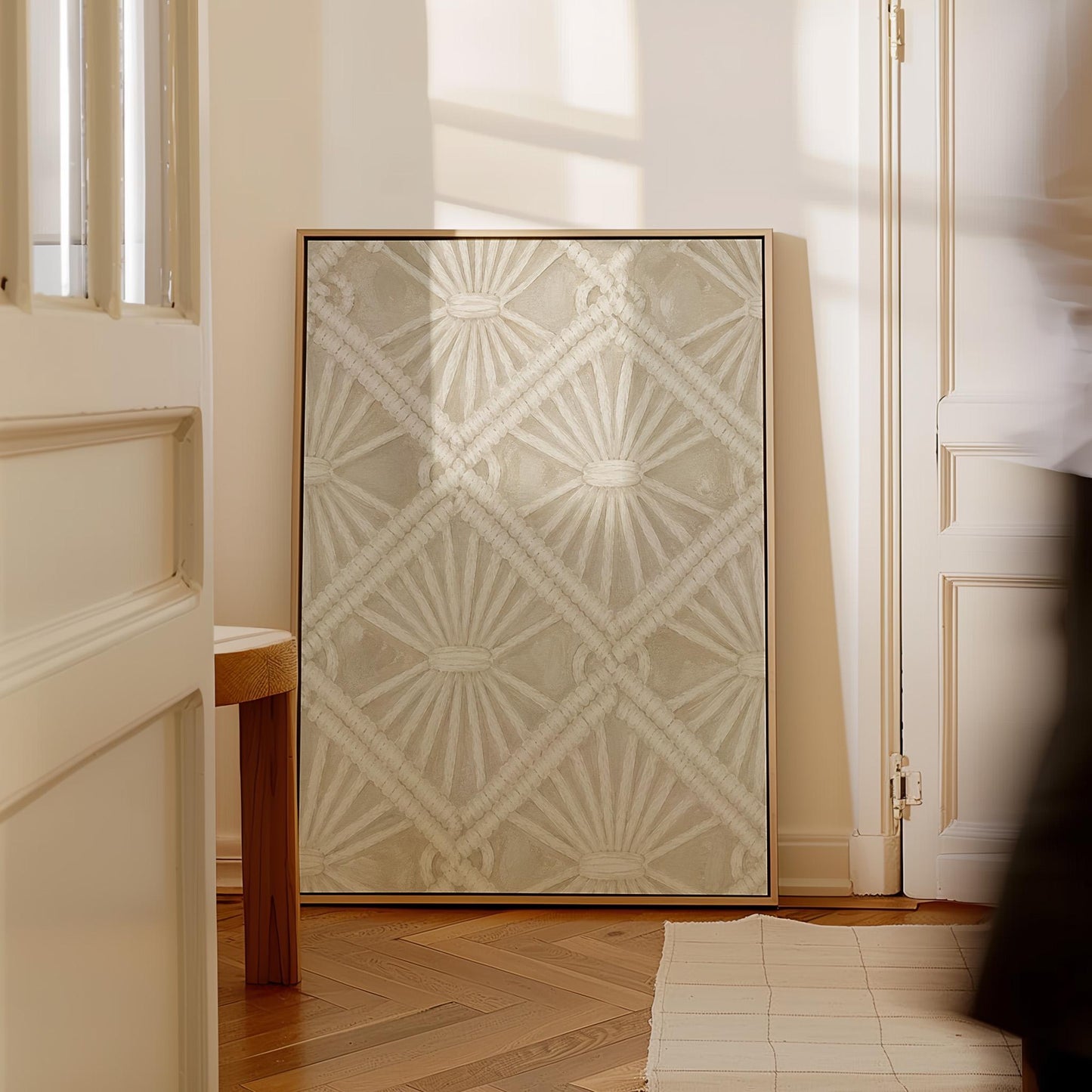 Diamond and fan lace pattern in ivory tones, canvas wall art styled against a soft white wall
