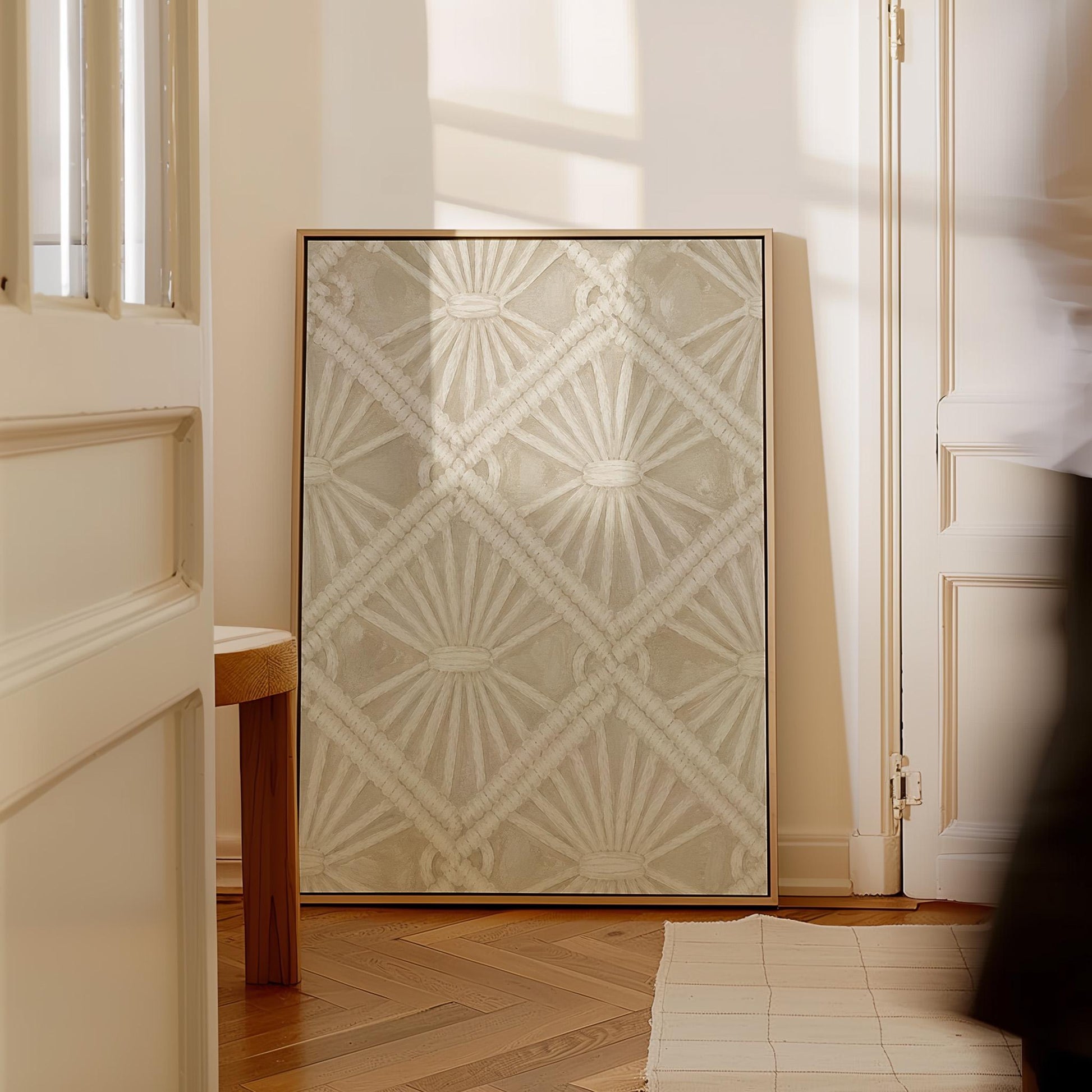 Diamond and fan lace pattern in ivory tones, canvas wall art styled against a soft white wall