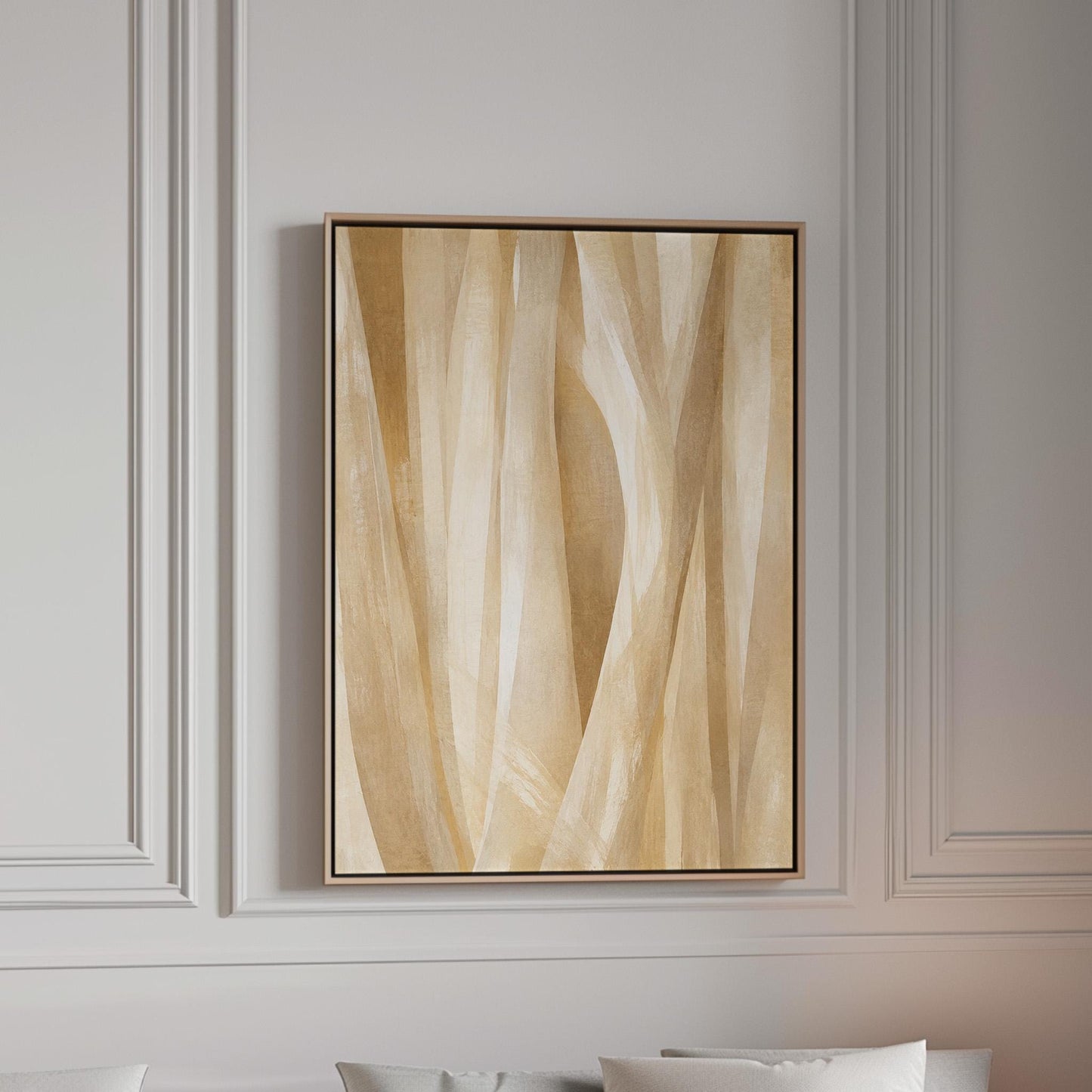 Golden beige ribbon strands flowing diagonally, canvas print in a bright room with natural daylight