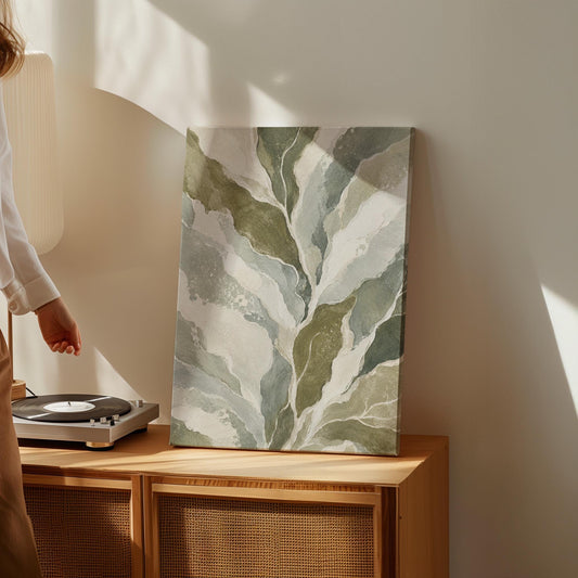 Flowing olive green leaves with soft marbled look, canvas print styled against a soft white wall