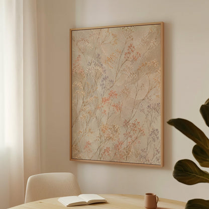 Fine sprigs and tiny blooms scattered on cream, canvas wall art seen in a warm interior with natural light