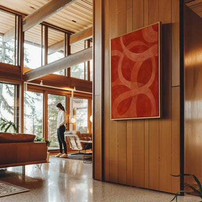 Interlocking loop rings in burnt orange and rust, canvas print styled against a soft white wall