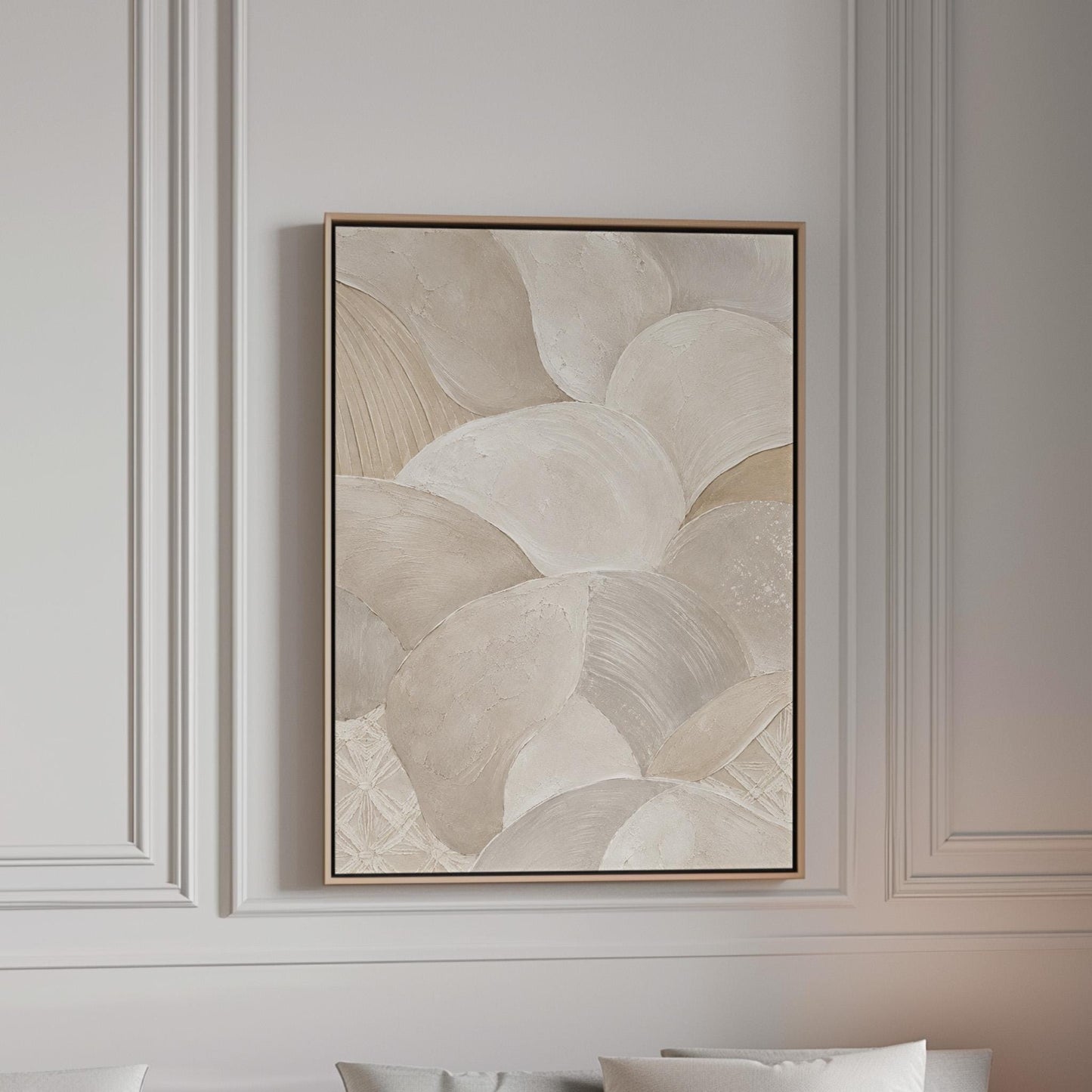 Sweeping layered petal curves in cream tones, canvas print in a bright room with natural daylight