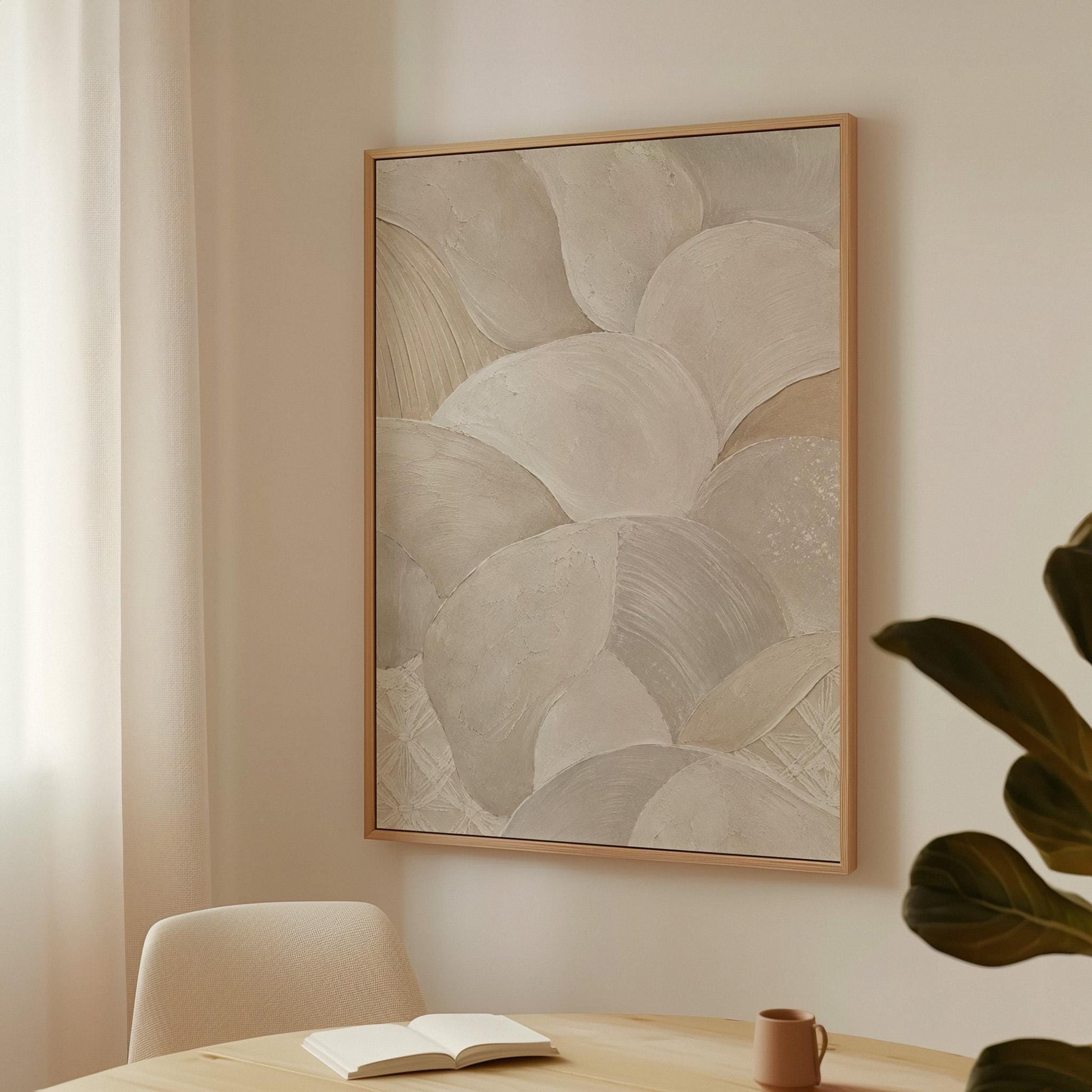 Sweeping layered petal curves in cream tones, canvas print seen in a warm interior with natural light