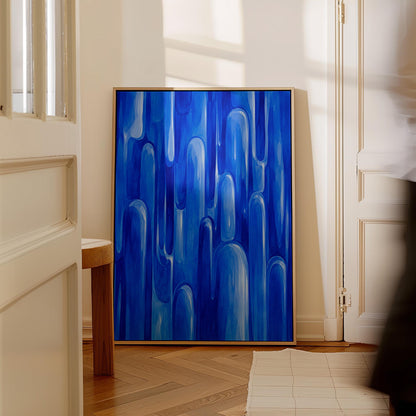 Vertical cobalt streaks like flowing rain, canvas print styled against a soft white wall