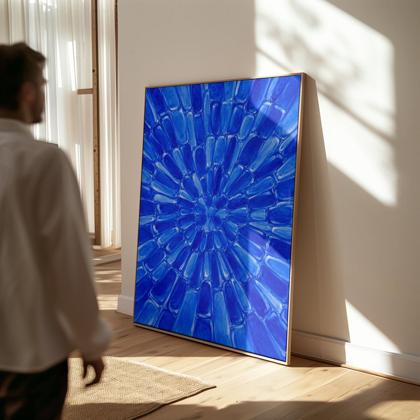 Radial starburst rays in electric cobalt blue, canvas print styled against a soft white wall