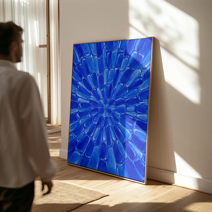 Radial starburst rays in electric cobalt blue, canvas print styled against a soft white wall