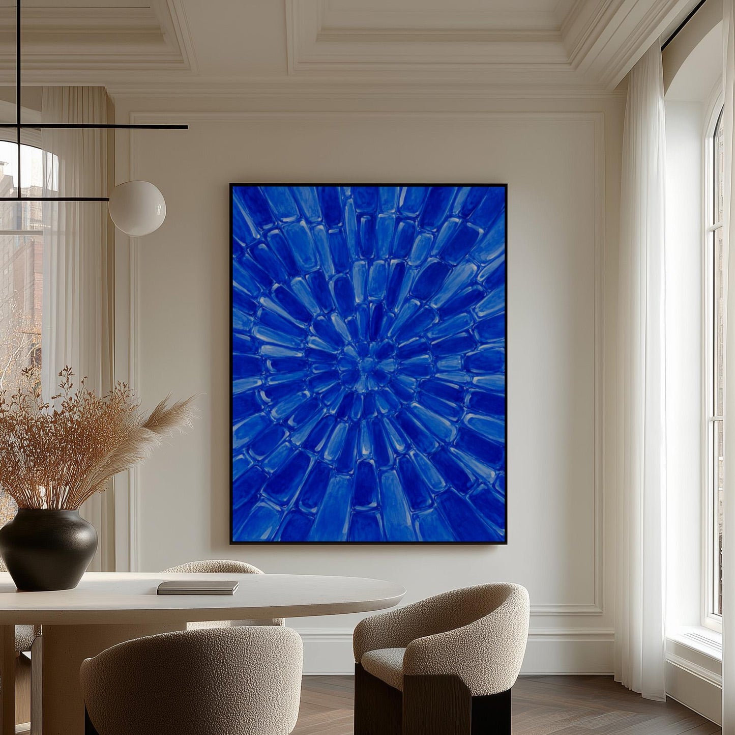 Radial starburst rays in electric cobalt blue, canvas wall art seen in a warm interior with natural light