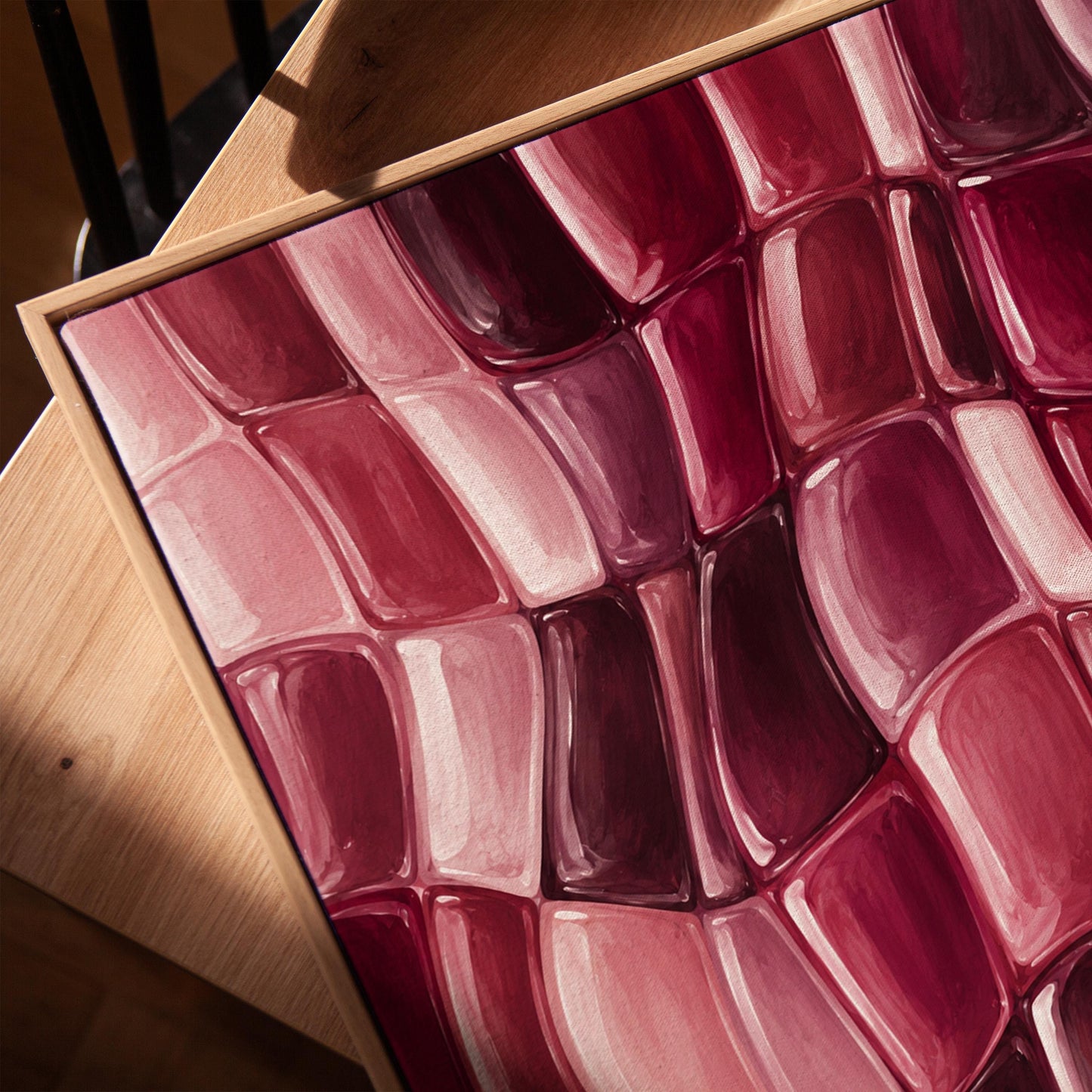 Wavy checkered weave in burgundy and wine tones, canvas print in a warm, minimally styled interior