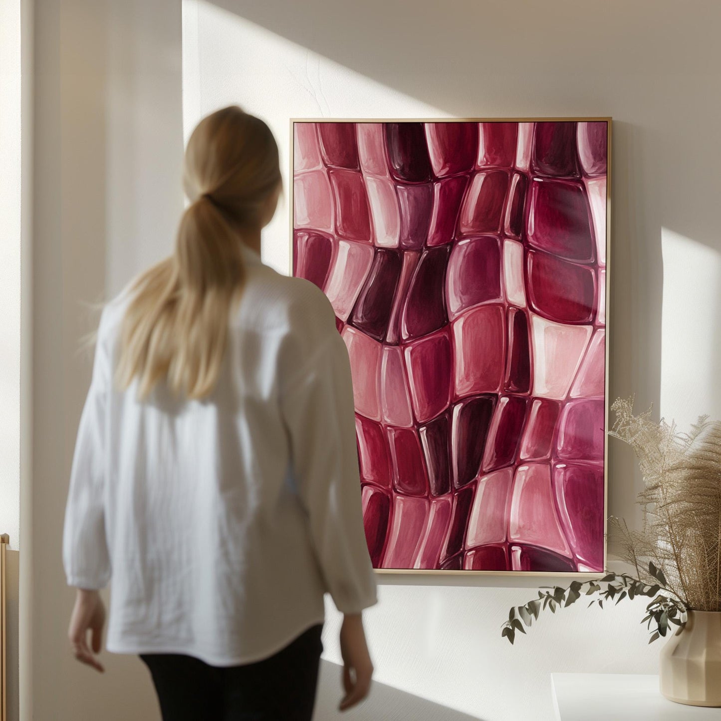 Wavy checkered weave in burgundy and wine tones, canvas print seen in a warm interior with natural light