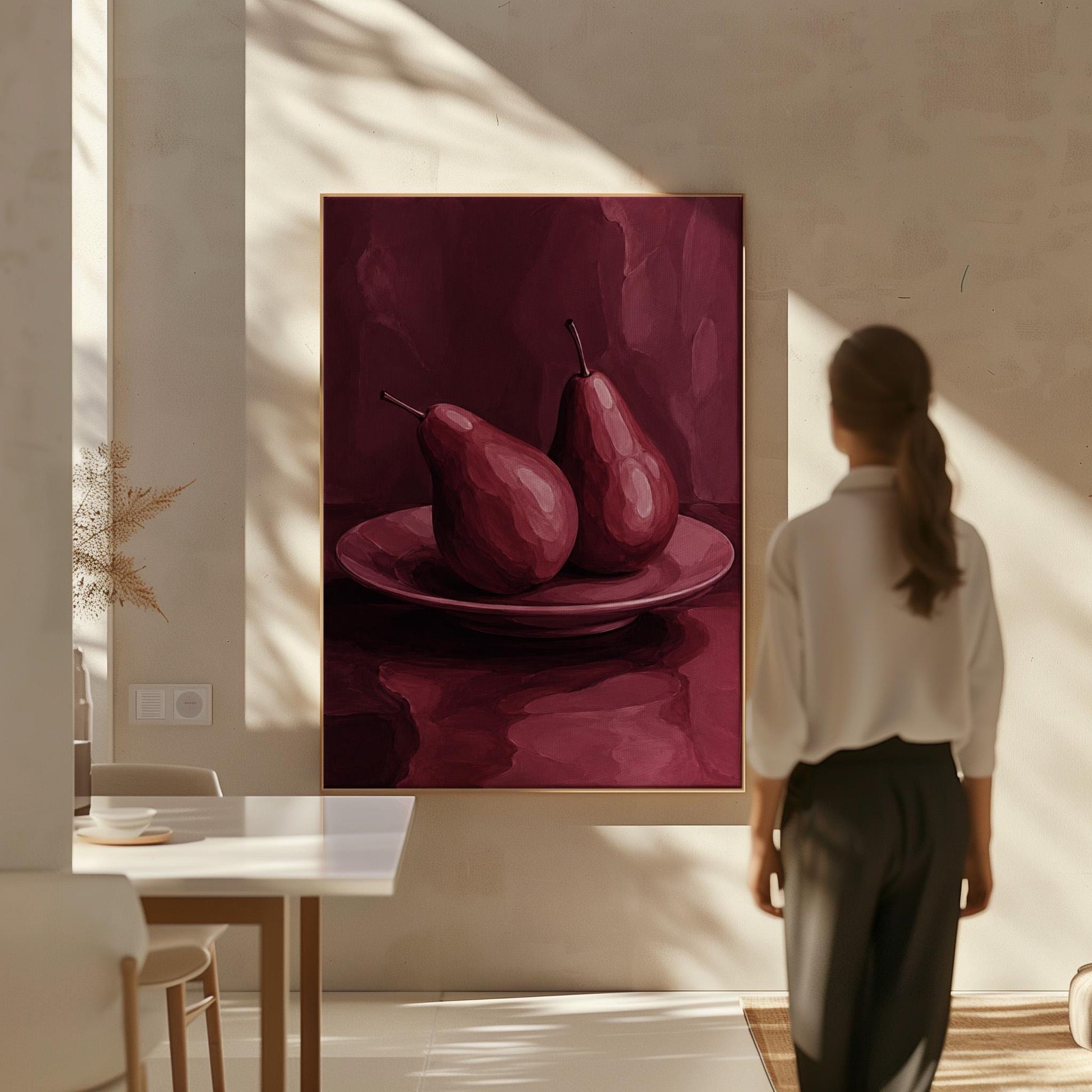 Two pears on a plate painted in burgundy monochrome, canvas print hanging in a calm, modern living space