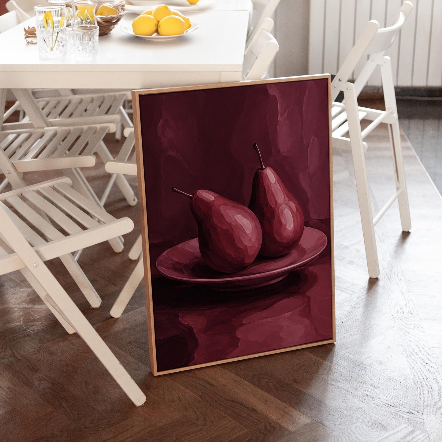 Two pears on a plate painted in burgundy monochrome, canvas print styled against a soft white wall