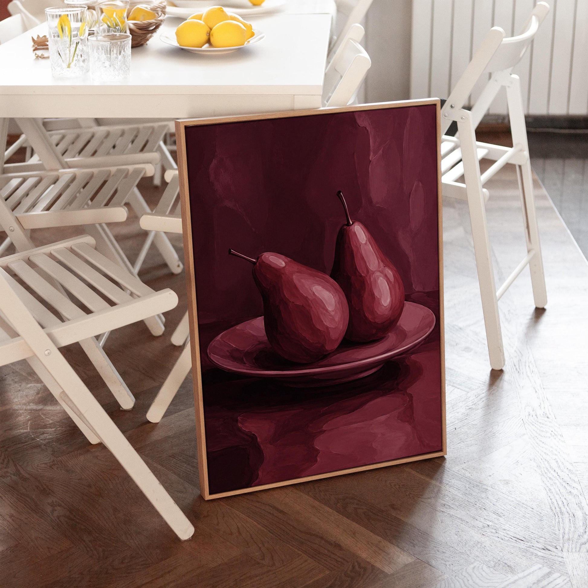 Two pears on a plate painted in burgundy monochrome, canvas print styled against a soft white wall