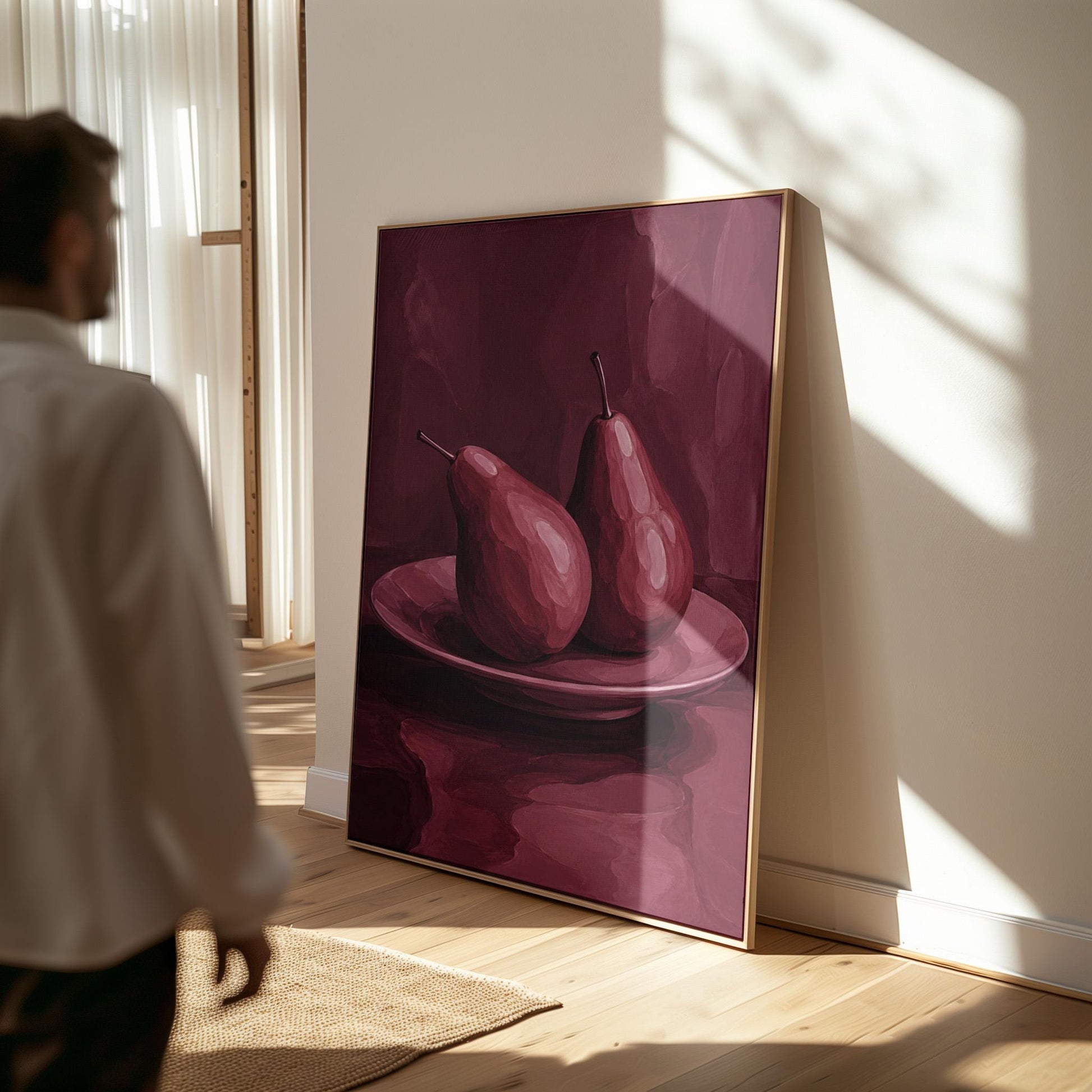 Two pears on a plate painted in burgundy monochrome, canvas wall art on a quiet wall in a considered interior