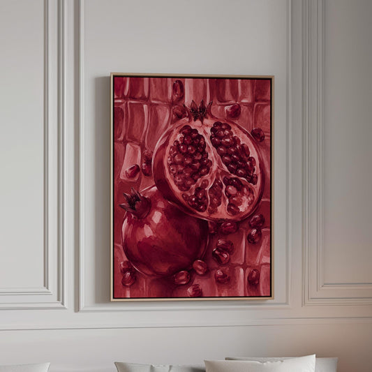 Open pomegranate with ruby seeds in burgundy tones, canvas print in a bright room with natural daylight