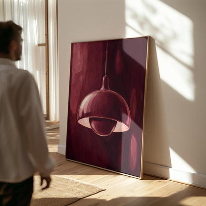 Pendant lamp glowing warmly against burgundy darkness, canvas print hanging in a calm, modern living space