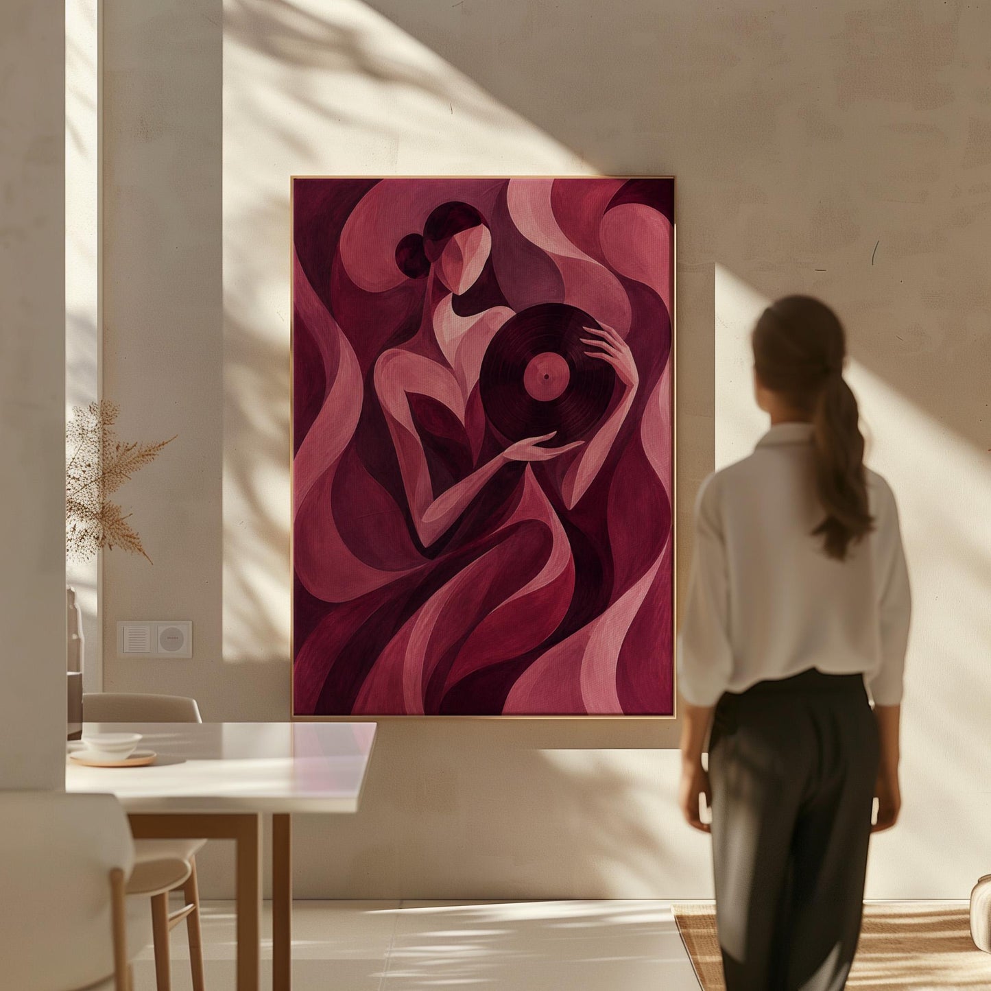 Woman holding vinyl record in burgundy deco style, canvas wall art seen in a warm interior with natural light
