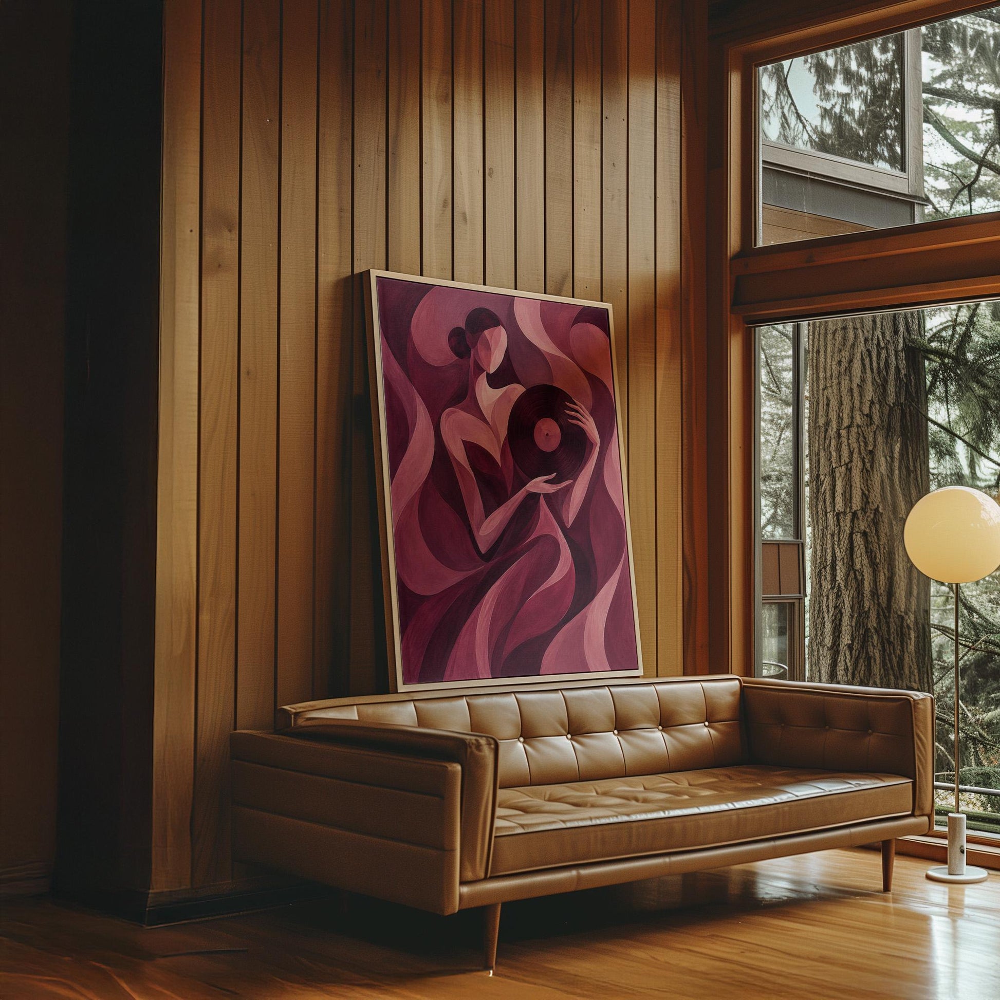 Woman holding vinyl record in burgundy deco style, canvas wall art on a quiet wall in a considered interior