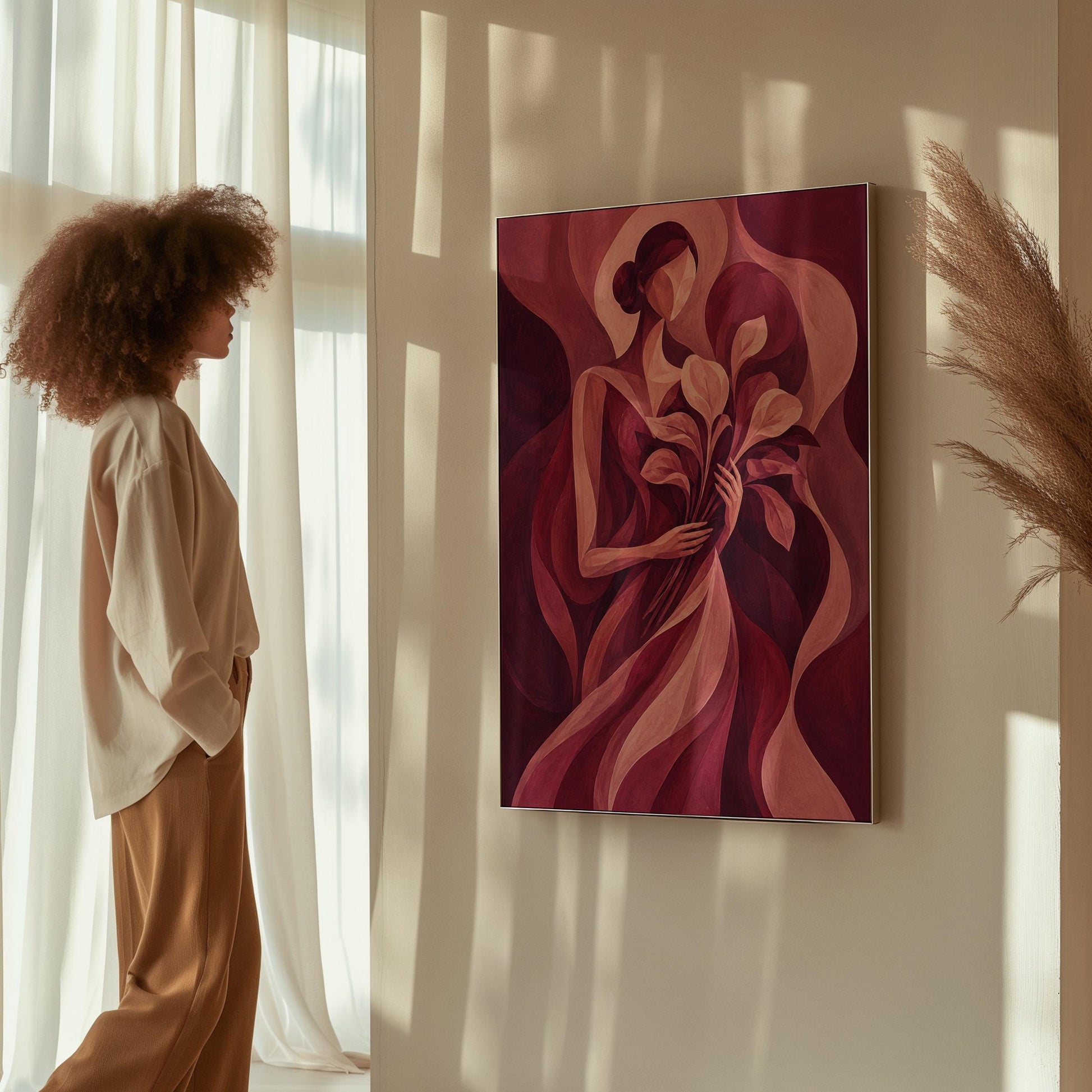 Woman holding tulips among burgundy waves, canvas wall art hanging in a calm, modern living space