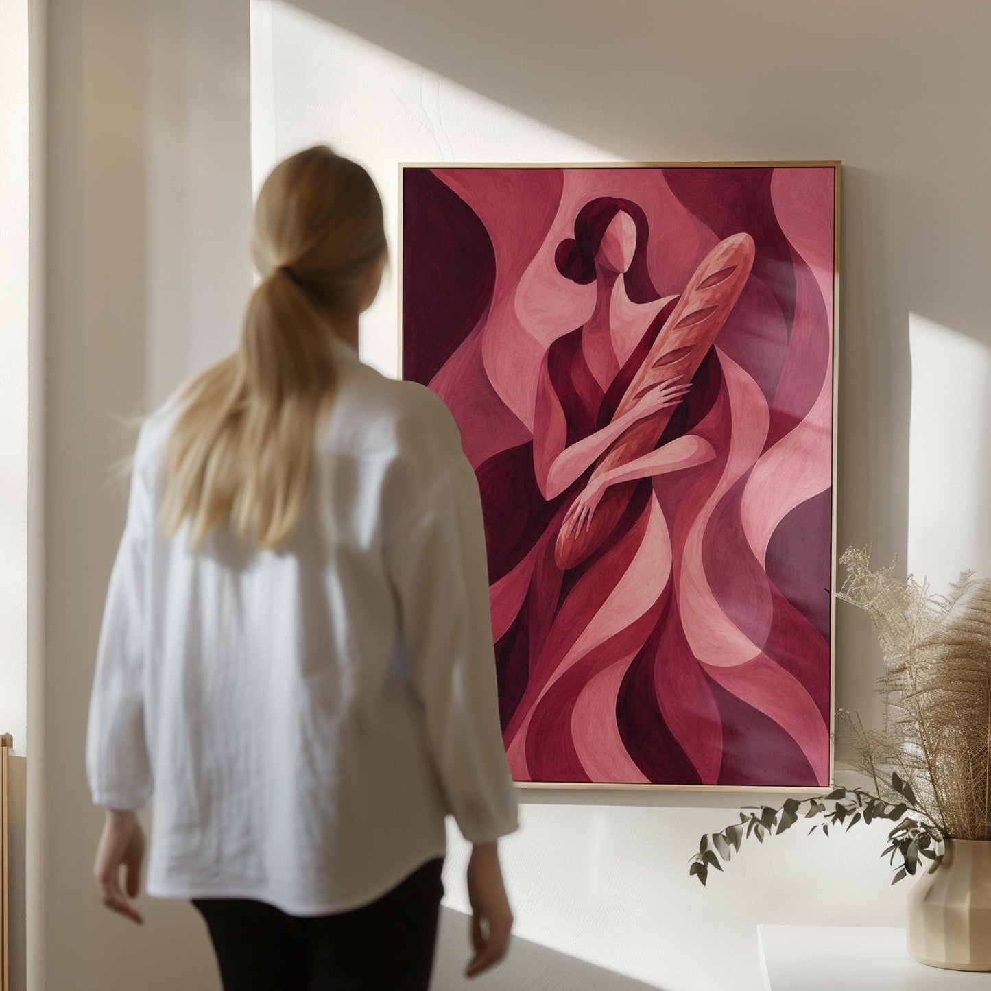 Woman holding baguette in burgundy deco style, canvas print on a quiet wall in a considered interior