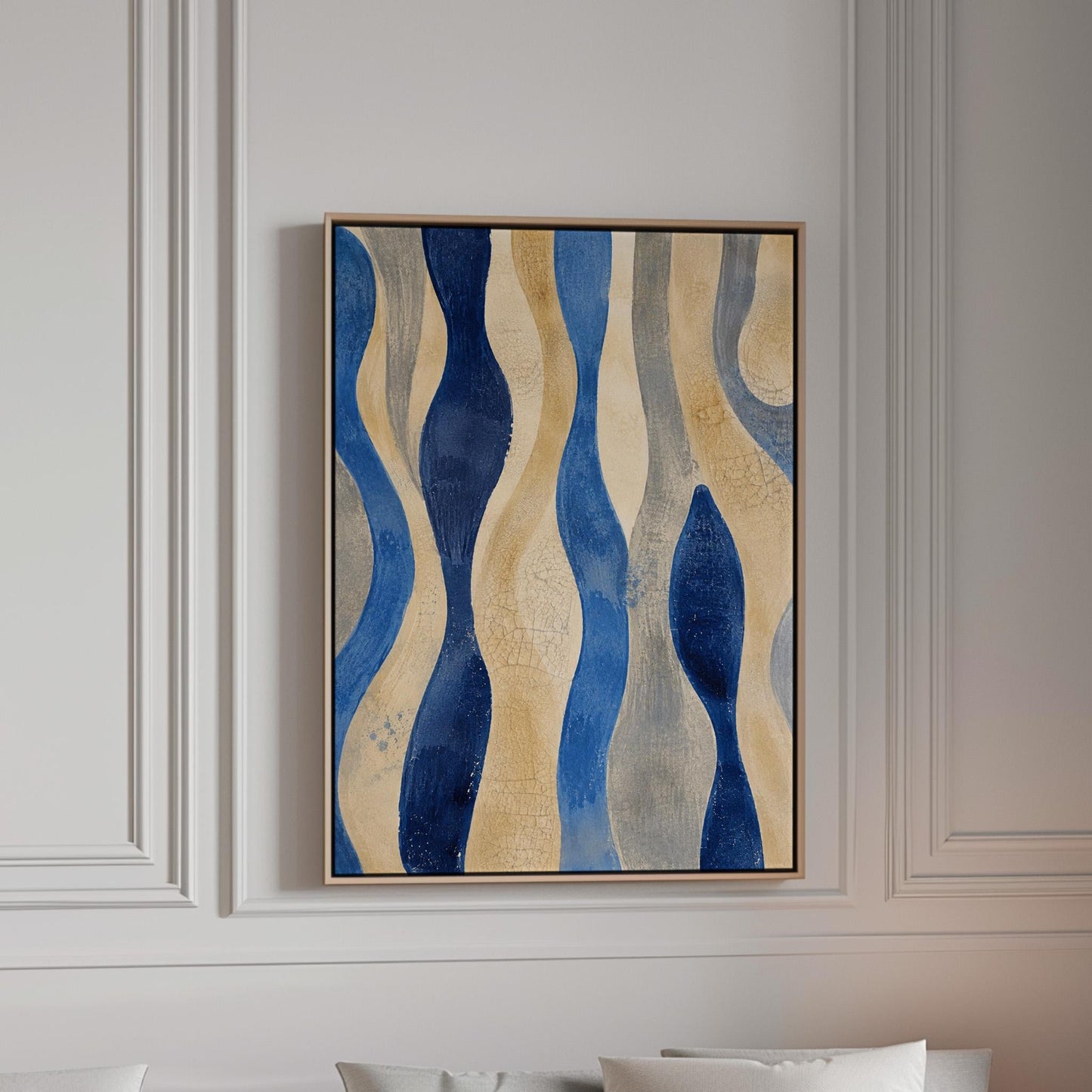 Vertical flowing wave bands in indigo and cream, canvas print in a bright room with natural daylight