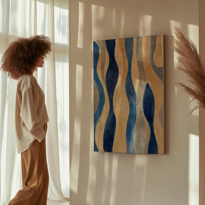 Vertical flowing wave bands in indigo and cream, canvas print seen in a warm interior with natural light