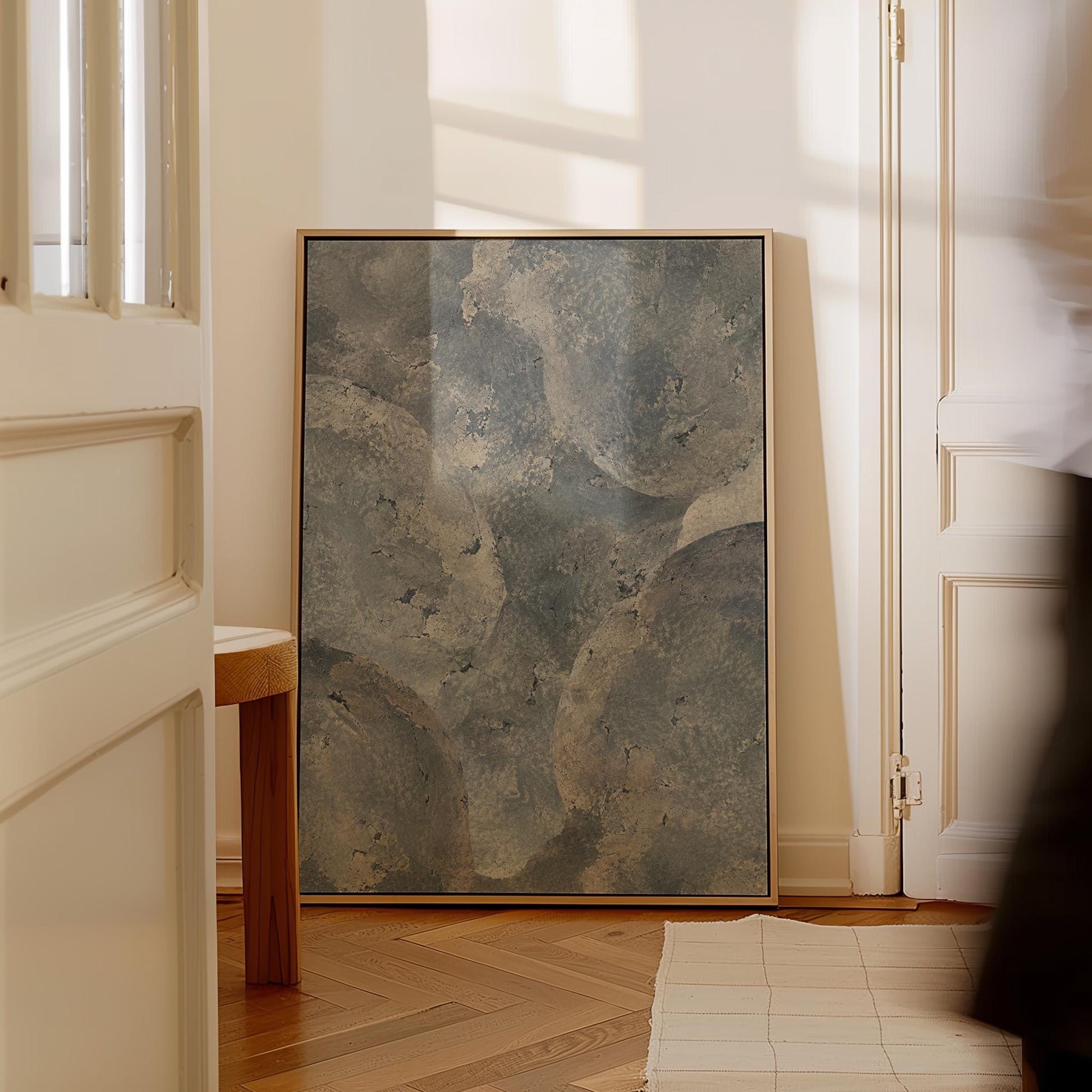 Layered misty gray cloud forms, canvas print seen in a warm interior with natural light