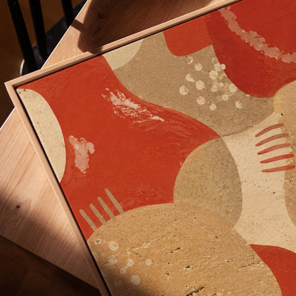 Interlocking terracotta and beige organic shapes, canvas print in a warm, minimally styled interior